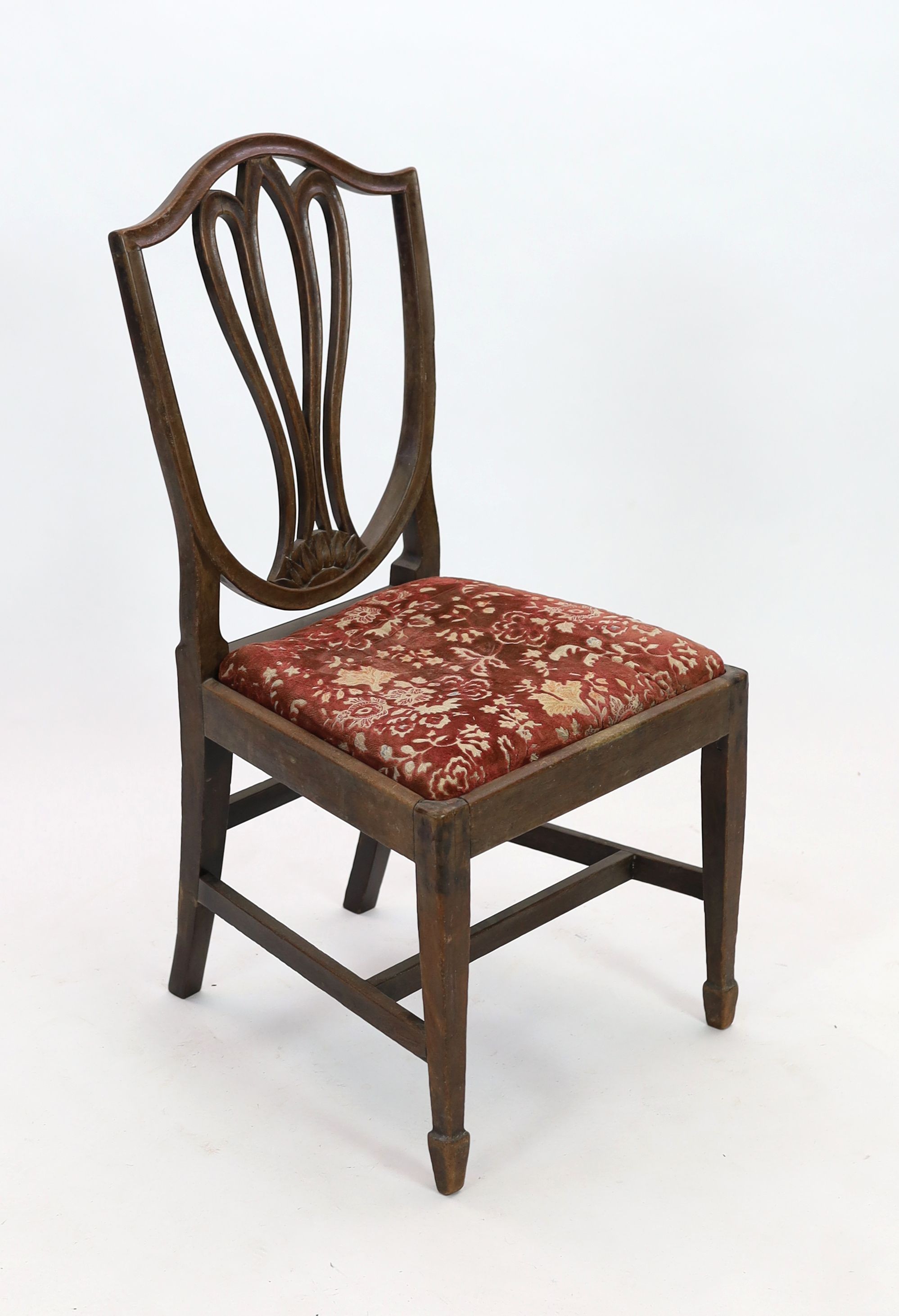 A George III Sheraton style provincial mahogany dining chair